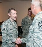 SrA Gillespie congratulated by command chief