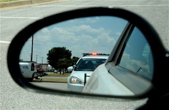 Cop car in mirror